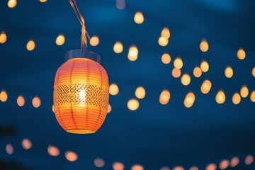 Obraz premium Warm Lantern Glow Against Night Sky and Blurred Twinkling Lights
