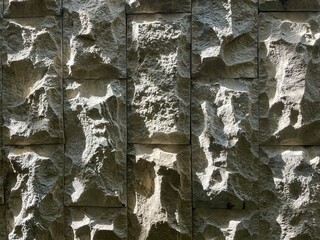 Stone tile texture shaded by sunlight