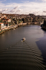 A breathtaking view of the Douro River in Porto
capturing the city&rsquo;s  mix of historic architecture