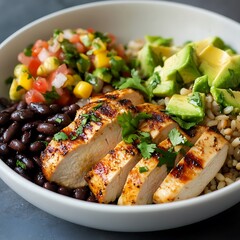 Delicious grilled chicken bowl with avocado and black beans healthy meal kitchen close-up food presentation