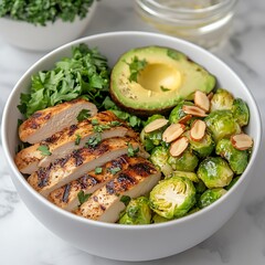 Healthy grilled chicken bowl with avocado & brussels sprouts gourmet food photography close-up