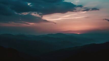 Obraz premium Dark Mountains Meet a Bright Sunset: A Natural Contrast