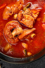 Tomato meat soup vegetable goulash fresh tasty food dish delicious gourmet food background on the table rustic food top view copy space keto and paleo diet