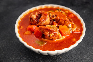 Tomato meat soup vegetable goulash fresh tasty food dish delicious gourmet food background on the table rustic food top view copy space keto and paleo diet