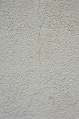 Texture of old rough plaster close-up.