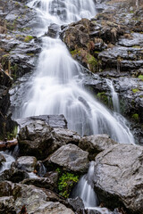 The view of the waterfall right before the spring in south Germany