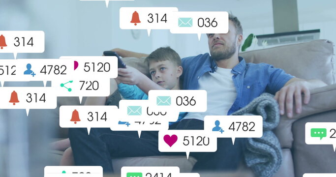 Watching TV on couch, man and child surrounded by social media notifications image - Powered by Adobe
