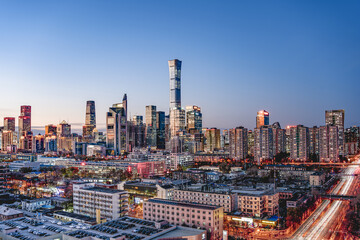 Obraz premium A panoramic view of the tall buildings in the city of Beijing, China at dusk