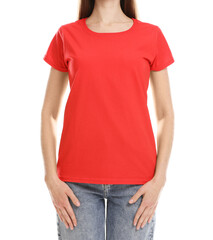 Obraz premium Woman wearing blank red t-shirt on white background, closeup. Mockup for design
