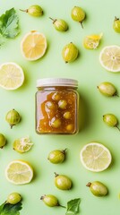 Glass jar filled with gooseberry jam, surrounded by fresh berries and lemon slices on verdant green surface, showcasing homemade preserving artistry