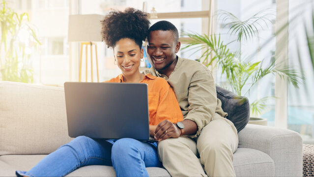 Laptop, movie and couple relax in home for bonding, relationship and watching comedy film on sofa. Dating, computer and happy black man and woman on streaming subscription, online videos and service