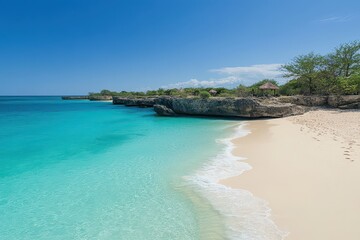 Fototapeta premium Serene beach scene with turquoise waters, soft sand, and rocky cliffs under a clear blue sky
