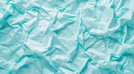 Obraz premium Light blue crumpled paper texture background.