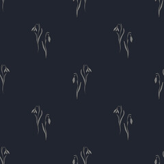 Seamless pattern of delicate snowdrop flowers on a dark spring background