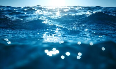 Serene Ocean Waves with Sunlight Glistening on Water Surface and Underwater Bubbles