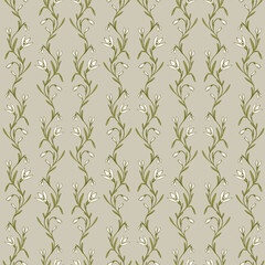 Seamless pattern featuring delicate snowdrop flowers in a spring design