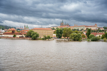 Fototapeta premium Flood in Prague. View of Prague Castle across the flooding river Vltava, Prague