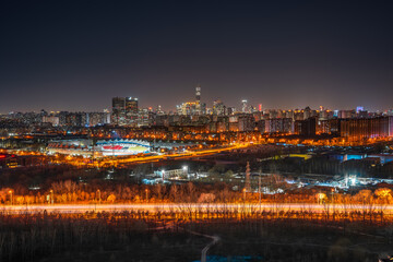 The scene of brilliant lights under the night view of the city in Beijing, China