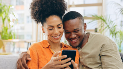 Couple, smile and hug with phone for social media, funny joke and post for bonding on sofa. Happy man and woman, diversity and streaming comedy movie or series, browsing and web scrolling for love