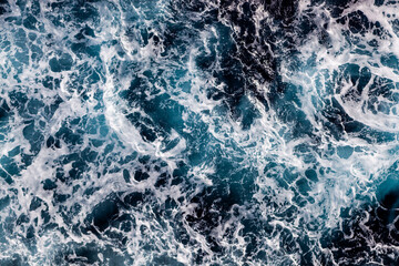 Sea surface background. Top view of classy foamy water. Can be used in covers, packaging, posters, textures, cards, art and design projects. Breathtaking nature background image.