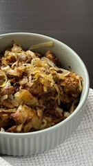 Delicious fried chicken or beef liver with salt, spices and herbs in a ceramic plate