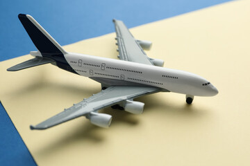 One plane model on color background, closeup