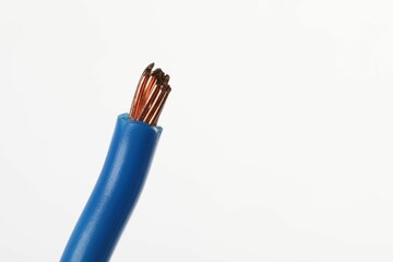 Blue stripped electrical wire with copper strands on white background