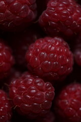 Close-Up of Fresh Ripe Red Raspberries with Detailed Texture and Vibrant Color