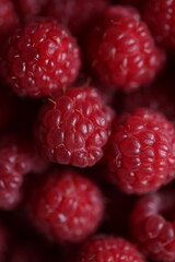 Close-Up of Fresh Ripe Red Raspberries with Detailed Texture and Vibrant Color