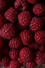 Close-Up of Fresh Ripe Red Raspberries with Detailed Texture and Vibrant Color