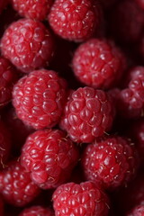 Close-Up of Fresh Ripe Red Raspberries with Detailed Texture and Vibrant Color