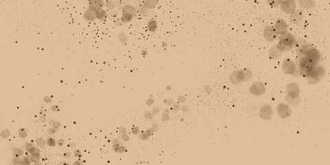 Brown and beige random round ink splashes on light beige sand background