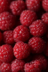 Close-up Macro Shot of Fresh Red Raspberries with Detailed Texture
