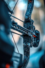 Fototapeta premium A detailed view of a bow and arrow, ideal for use in outdoor adventure or fantasy themes