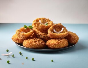 Australian breaded onion rings piled on plate with parsley garnish