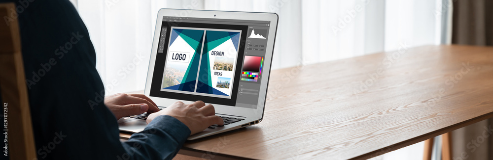 Wall mural graphic designer software for modern design of web page and commercial ads showing on the computer s