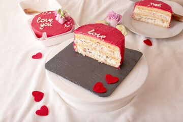 Romantic pink valentine's cake with love message and heart decorations