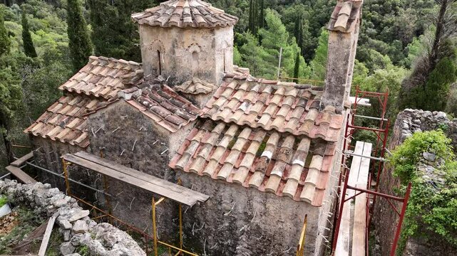 Aerial view of Moni Likakiou Monastery with visible scaffolding Near Kardamyli, Greece