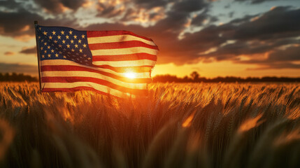 American flag waving in a golden wheat field at sunset representing freedom and agriculture

