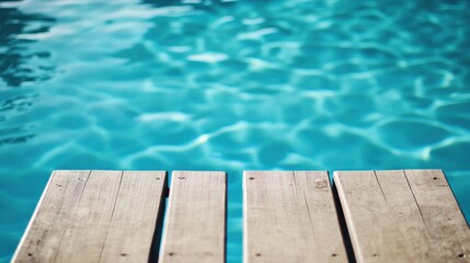 Wooden Planks Beside Light-Blue Pool Water