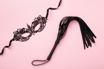 Set of erotic BDSM accessories on color background, top view