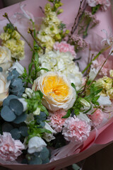 A Stunning Arrangement Featuring a Beautiful Bouquet of Pink and White Roses Alongside Lilies