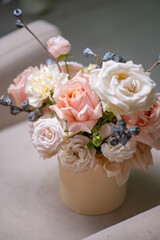 A Stunning Arrangement Featuring a Beautiful Bouquet of Pink and White Roses Alongside Lilies