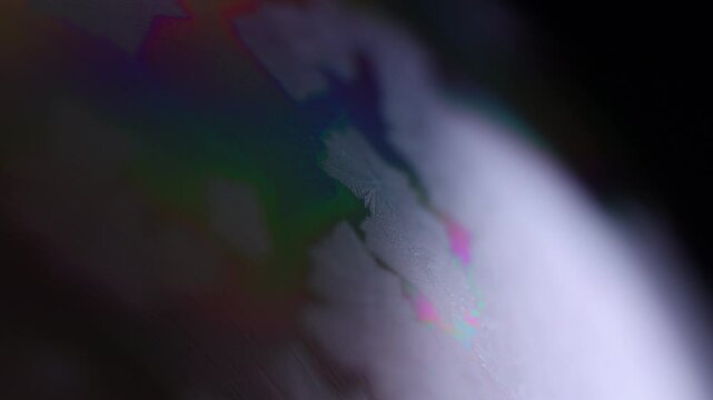 Real-time crystal growth on liquid surface, unique physical phenomenon. Freezing of water in macro. Salt crystal growth, beautiful experiment. Ice crystals