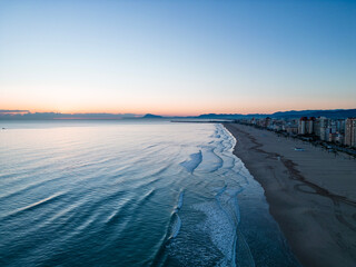 Aerial View of Playa del Grao de Gandia at Sunrise with Coastal Cityscape, Spain