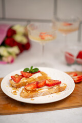 Strawberry and cottage cheese sandwich on white table