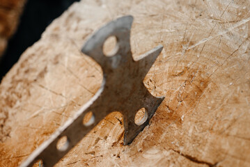 metal axe in wooden stump as target, throwing axes and knives, sports competition, selective focus