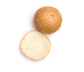 two halves of round bread on white background