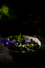 Fresh summer salad with edible flowers