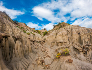 Stunning Landscape of Tatacoa Desert Featuring Unusual Rock Formations and Clear Blue Sky